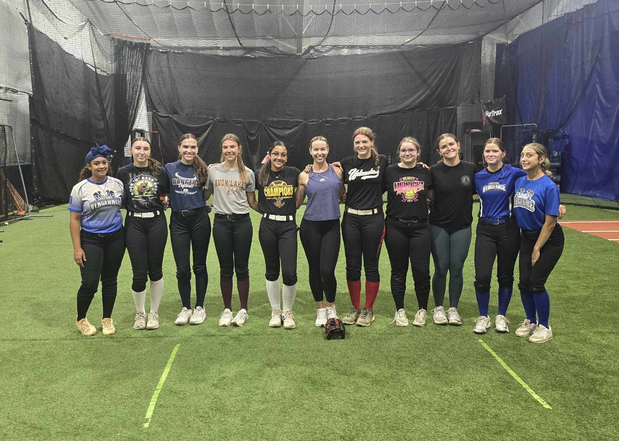 Lake Erie Vengeance players standing with Jessie Harper after the clinic