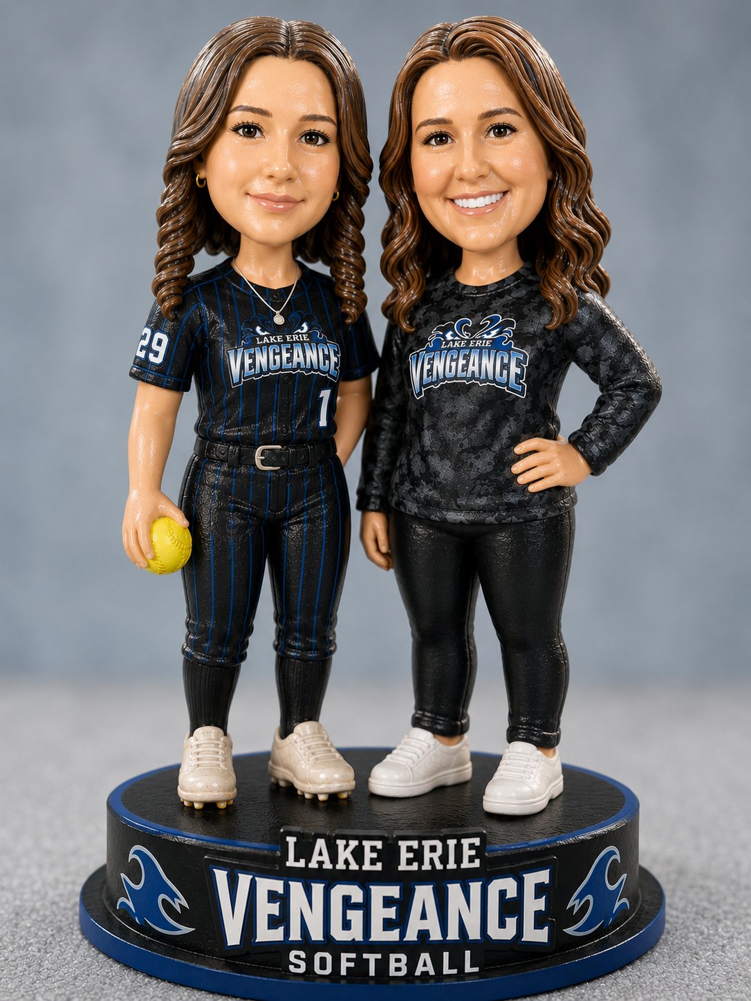 Lake Erie Vengeance player and coach bobblehead figures on a branded base